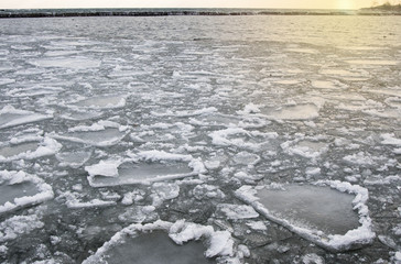 icy lake at sunset