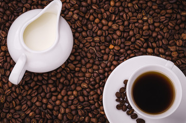 coffee background with cup and creamer top view/coffee background with cup and creamer