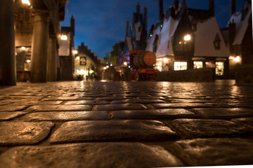 Obraz premium Pavement alley at night in old town city street.