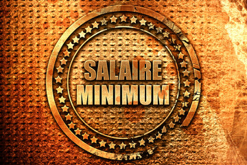 French text "salaire minimum" on grunge metal background, 3D ren