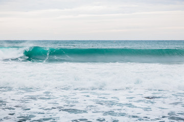 Blue wave in ocean and clouds sky. Swell on Hawaii