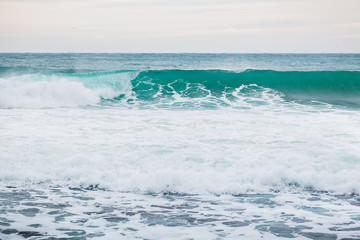 Fototapeta premium Blue wave in ocean and clouds sky. Wave for sufring