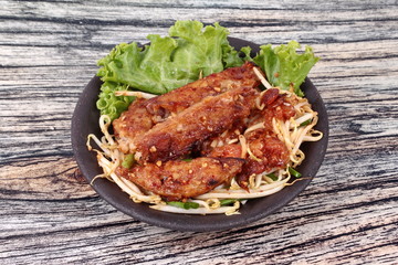 Fried steamed grated radish with shallot and bean sprouts.