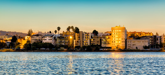 Oakland, California Lake Merritt waterfront buildings at sunset - 138514398