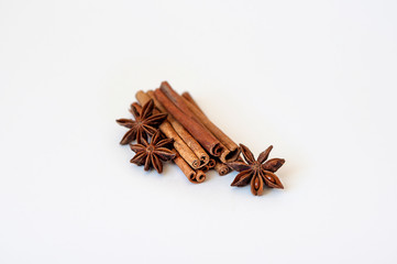 Cinnamon and star anise on white background