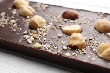 Dark chocolate with nuts, closeup