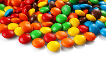 Fototapeta na wymiar Colorful candies on white background, closeup