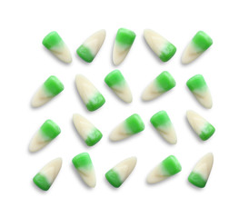 Colorful Halloween candies on white background