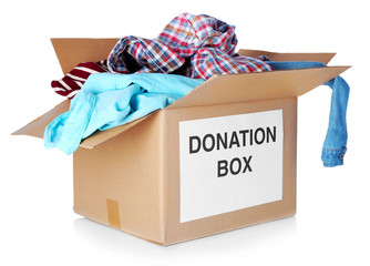 Donation box with clothes isolated on white
