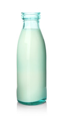 Glass bottle of tasty milk on white background