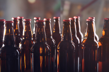 Bottles of beer on blurred background