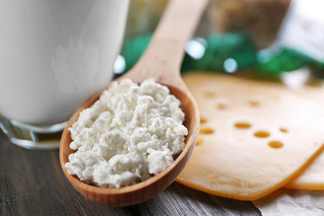 Wooden spoon with curd, closeup