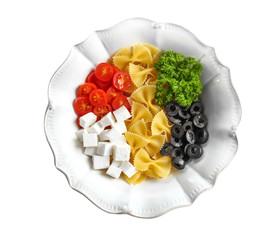 Plate with ingredients on white background