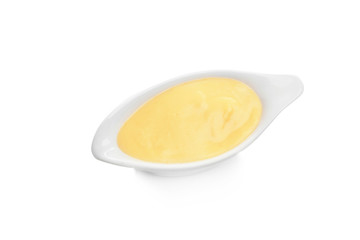 Sauceboat full of creamy cheese, isolated on white