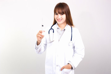 Young Asian female doctor with mask hold syringe isolated on white background.