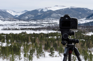 Camera on Tripod Capturing Landscape