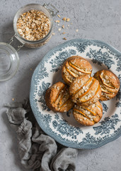 Vegetarian apple oat muffins on light background, top view