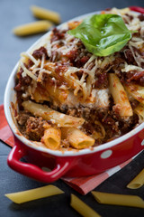 Close-up of a baking dish with traditional italian ziti