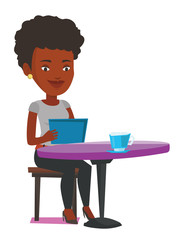 Woman surfing in the social network in cafe.