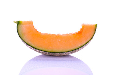 cantaloupe close up isolated on white background.