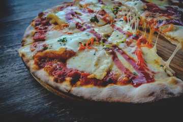 pizza Italian foods cheese on wood background .