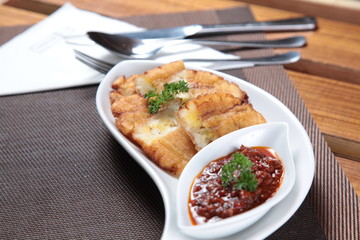 Fried banana snack with indonesian sambal
