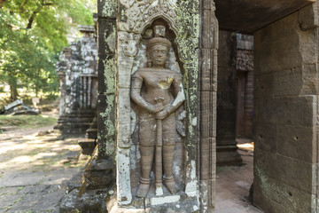 Ancient Wat Phu Khmer temple, Pakse, Champasak,Laos. Rock carving of Apsara, female spirit in Buddhist at Wat Phu,Khmer Hindu temple complex and UNESCO World Heritage Site in Champasak Province, Laos