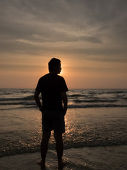 silhouette man on the beach