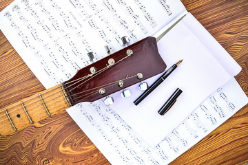 Fototapeta premium Music book and acoustic guita