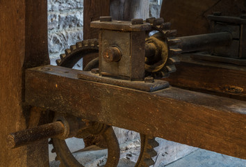Fototapeta na wymiar The pinion gear of an old mechanical device