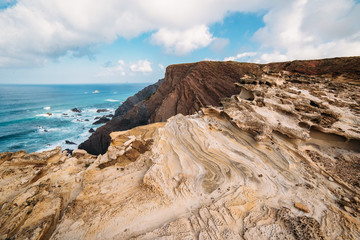 Fototapeta na wymiar Rocks and Cliffs along the Coast of Lagos, Algarve, Portugal