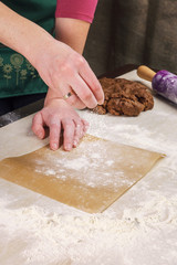 Sprinkling flour on parchment paper