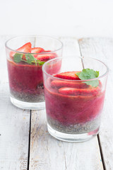 fruit pudding by the glass on a white background.