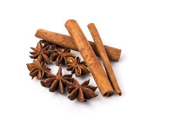 Fragrant anise and cinnamon isolated on white background