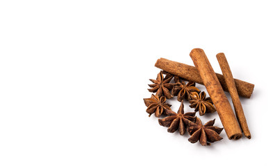Fragrant anise and cinnamon isolated on white background