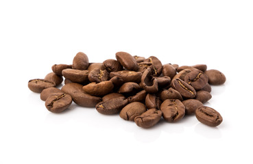 Roasted coffee beans on white background