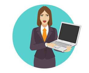 Businesswoman holding a laptop notebook and clicks on the button
