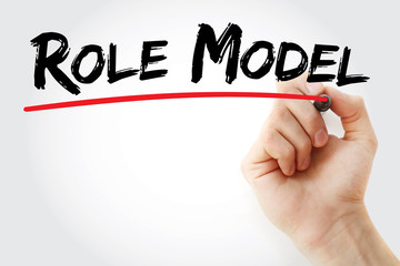 Hand writing role model with marker, concept background