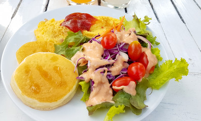 Honey Pancake and omlet with vegetable salad