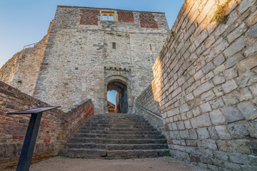 Fototapeta na wymiar Old castle flint and steps