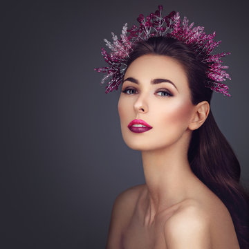 Beautiful Girl With Purple Makeup And Head Piece