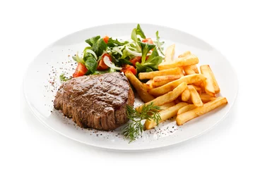 Gordijnen Grilled steak, French fries and vegetables  © Jacek Chabraszewski