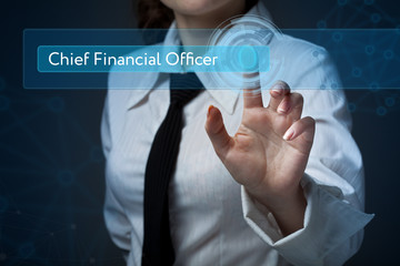 Business, technology, internet and networking concept. Business woman presses a button on the virtual screen: Chief Financial Officer