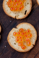 Salmon caviar on bread