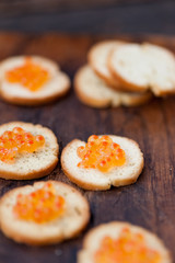 Salmon caviar on bread