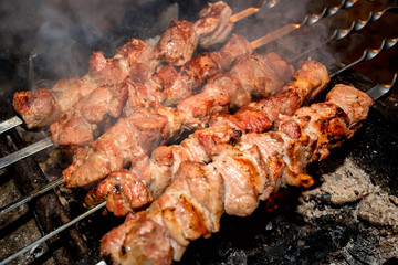 Preparing shashlik on mangal