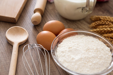 Fototapeta na wymiar Flour and eggs preparing baking ingredients.