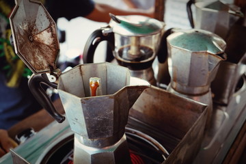 moka pot Italian traditional coffee maker with hot coffee