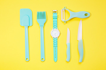 Cooking tools and kitchen utensil on color background