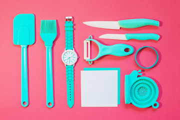 Cooking tools and kitchen utensil on color background